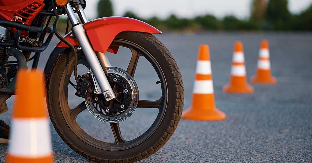 Motorcyclist training with road cones for Motorcycle License