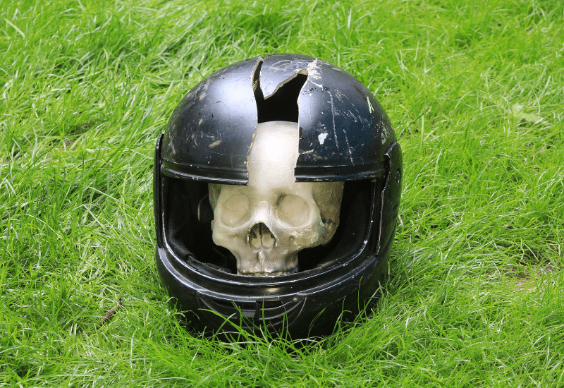 motorcycle helmet cracked showing protected skull inside