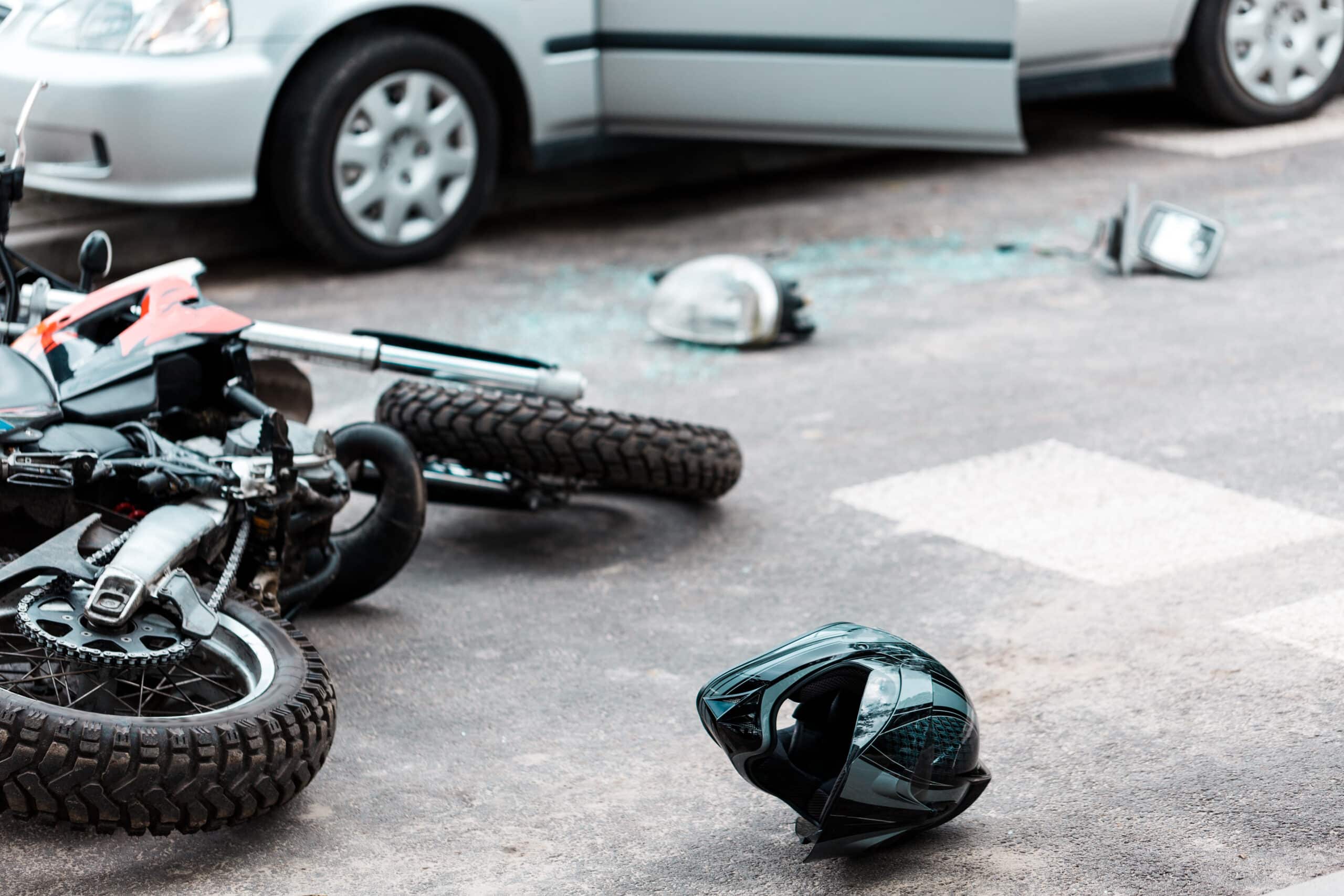 Motorcycle helmet on ground after accident
