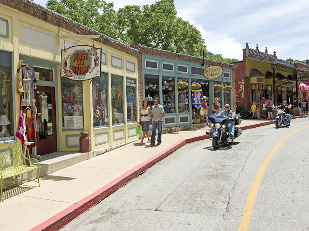 Motorcycles ride through Eureka Springs during the Flatheads Point Rally Sept. 21-24.