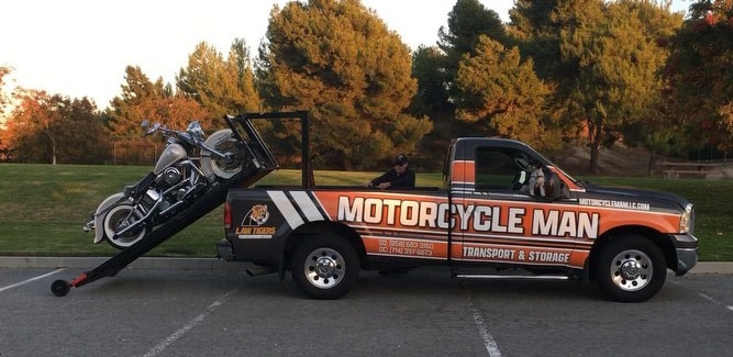 Noel Dobson of Motorcycle Man Transport and Storage uses a special lift to tow motorcycles.