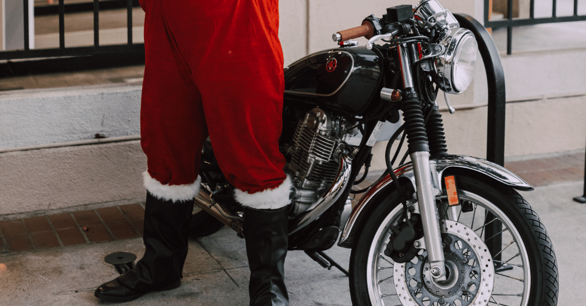 Photo of Santa near a motorcycle