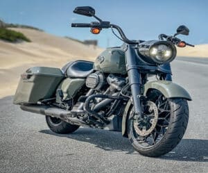 Photo of a 2021 Deadwood Green Harley-Davidson Road King motorcycle.